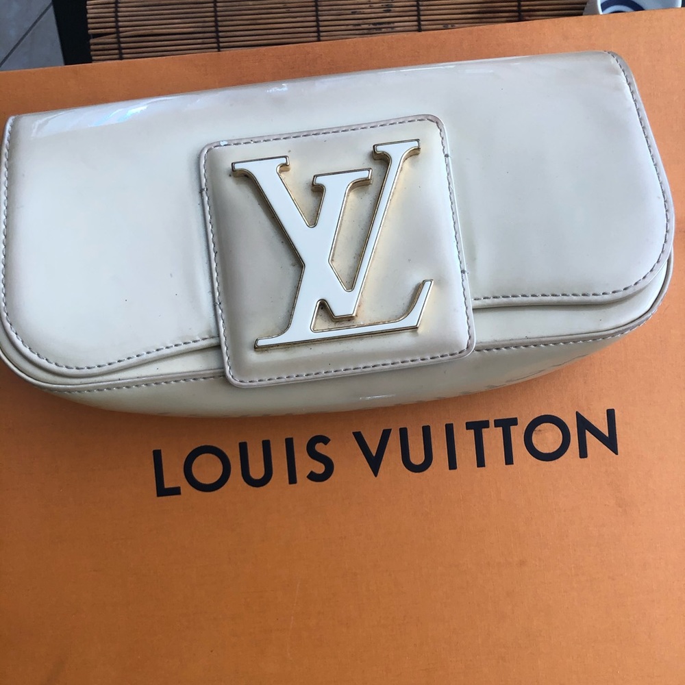 100% authentic Louis Vuitton pearl clutch bag